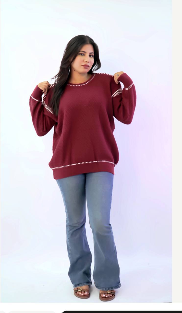 سويتر تريكو واسع بلمسة أنثوية