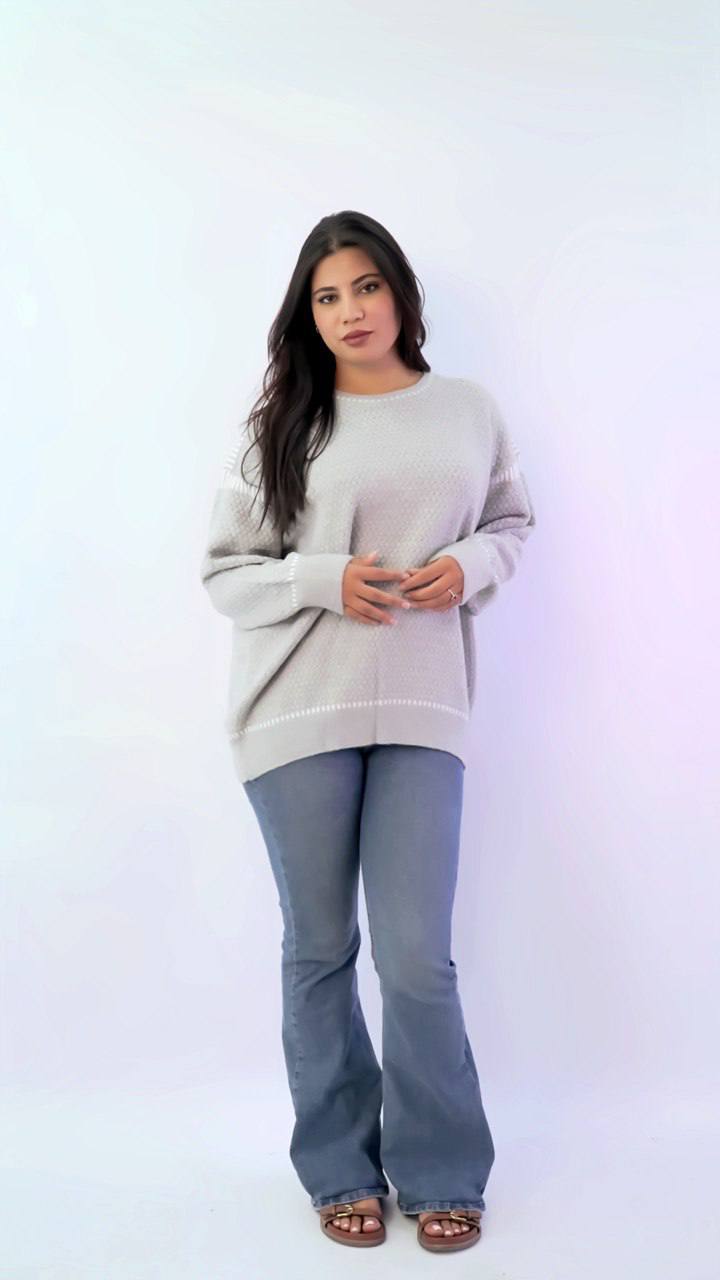 سويتر تريكو واسع بلمسة أنثوية