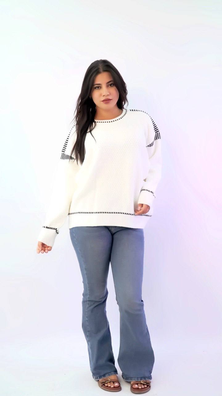 سويتر تريكو واسع بلمسة أنثوية