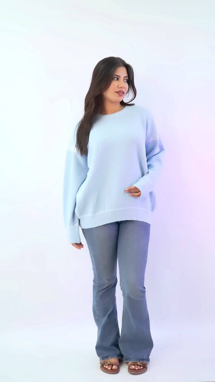 سويتر تريكو واسع بلمسة أنثوية