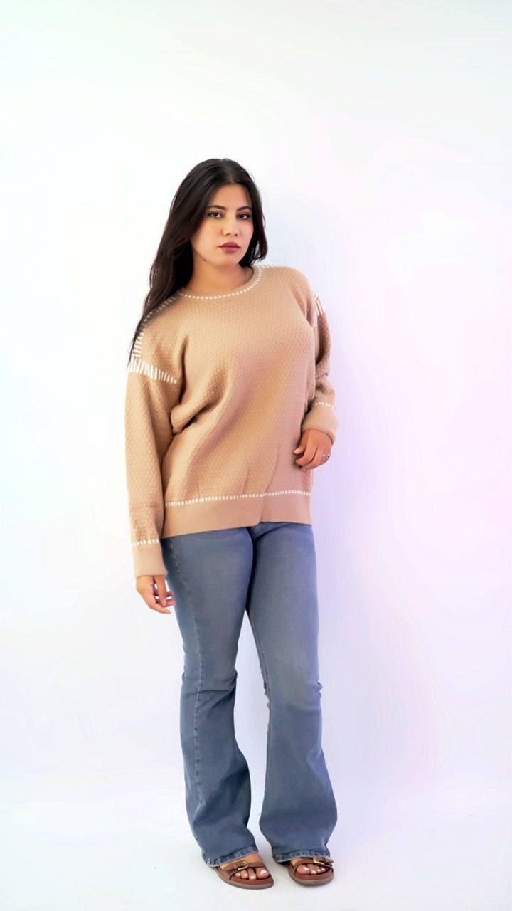 سويتر تريكو واسع بلمسة أنثوية